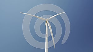 Wind turbine or windmill spinning by the wind