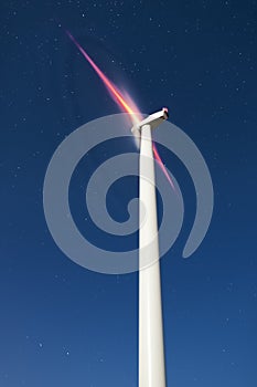 Wind turbine working at night.