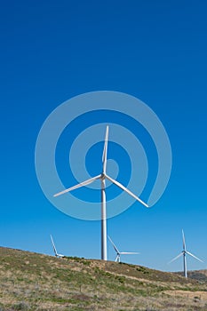 Wind Turbines Above Ridge Line