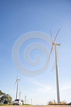 Wind turbines are alternative electricity sources, the concept of sustainable resources, Beautiful sky with wind generators