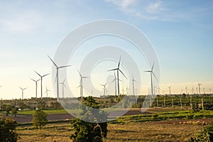 Wind turbines are alternative electricity sources, the concept of sustainable resources, Beautiful sky with wind generators