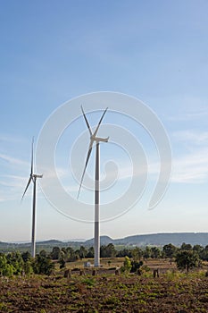 Wind turbines are alternative electricity sources, the concept of sustainable resources, Beautiful sky with wind generators