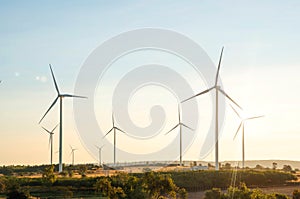 Wind turbines are alternative electricity sources, the concept of sustainable resources, Beautiful sky with wind generators