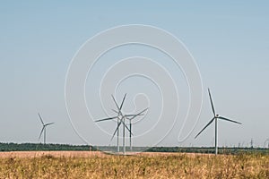 Wind turbines in an arid landscape. An alternative way of generating electricity