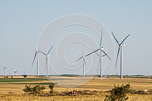 Wind turbines in an arid landscape. An alternative way of generating electricity