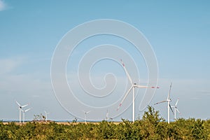 Wind turbines in an arid landscape. An alternative way of generating electricity