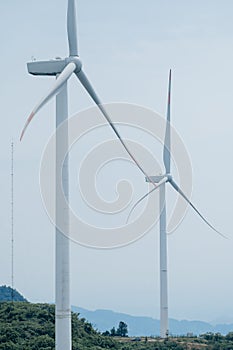 Wind turbines and blue skies and white clouds