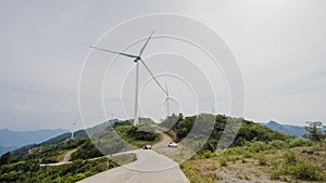 Wind turbines and blue skies and white clouds