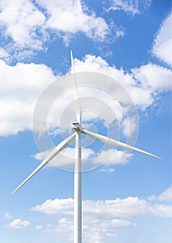Wind turbines in the blue sky on a sunny day, produced electricity from pure energy