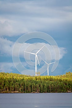 Wind turbines, converting the wind`s kinetic energy into electrical energy - ecologically clean source of energy.