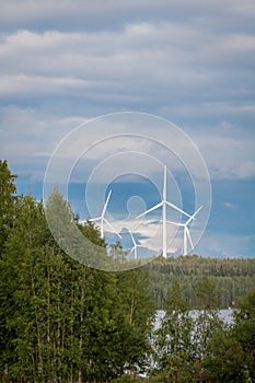 Wind turbines, converting the wind`s kinetic energy into electrical energy - ecologically clean source of energy.