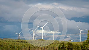 Wind turbines, converting the wind`s kinetic energy into electrical energy - ecologically clean source of energy.