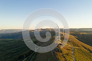 Wind turbines drone aerial view renewable energy on the middle of Serra da Freita Arouca Geopark, in Portugal