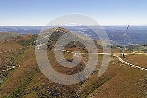 Wind turbines drone aerial view renewable energy on the middle of Serra da Freita Arouca Geopark, in Portugal