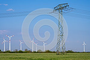 Wind turbines and an electricity pylon with power lines