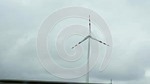 Wind turbines energy production. Windmill farm. Windmill green energy. Renewable energy production for green ecological world. Win