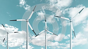 Wind turbines farm at beautiful blue sky background. Ecologic energy generators on cloud mountain landscape. Green