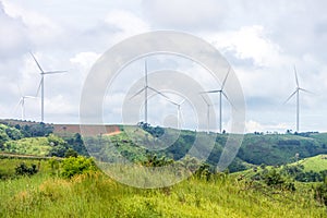 Wind turbines farm on mountain in rural area