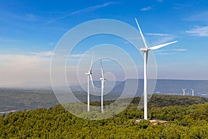Wind turbines farm on mountanis landscape at Lam Takong Reservoir Views against blue sky with clouds background,Windmills for