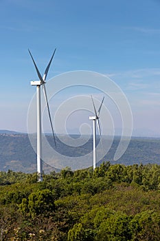Wind turbines farm on mountanis landscape at Lam Takong Reservoir Views against blue sky with clouds background,Windmills for