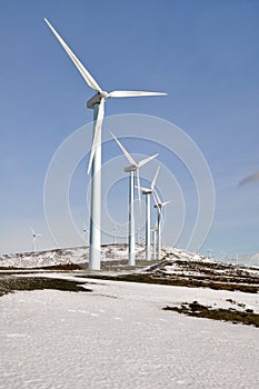 Wind turbines farm in winter (Basque Country)