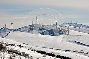 Wind turbines farm in winter (Basque Country)