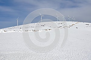 Wind turbines farm in winter (Basque Country)