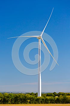 Wind turbines generating electricity with blue sky - energy conservation concept