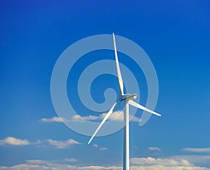 Wind turbines generating electricity in windfarm