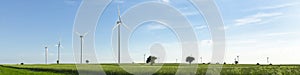 Wind turbines in green field