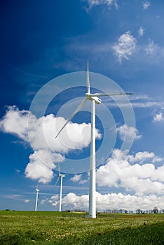 Wind turbines in green field