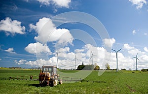 Wind turbines in green field