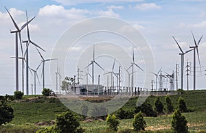 Wind turbines with high voltage electrical power pylon substation for renewable wind energy