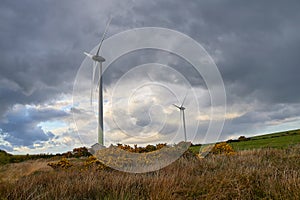 Wind turbines on the hill, Wind farm. Green ecological power energy generation. Alternative energy plant, Ireland