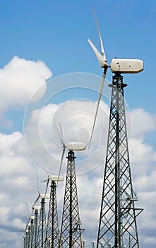 Wind turbines over sky