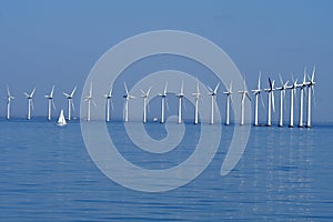 Wind turbines park in danish water in sea of Denmark