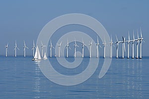 Wind turbines park in danish water in sea of Denmark