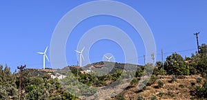 Wind turbines in the plain in the hills.