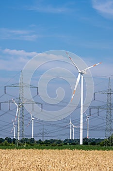 Wind turbines, power lines and electricity pylons