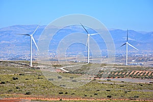 Wind turbines producing energy photo