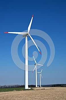 Wind turbines. Renewable energy with wind turbines. Windmills for electric power production
