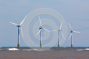 Wind turbines at sea Renewable energy offshore windfarm