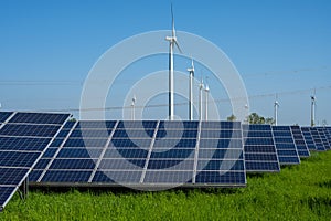 Wind turbines, solar panels and power lines