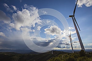 Wind turbines and storm in Anoia, Barcelona, Spain