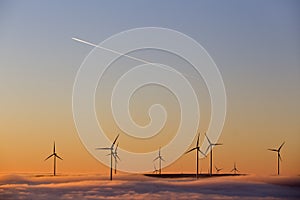 Wind turbines at sunset