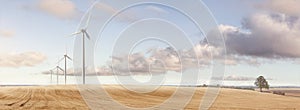 Wind turbines on a vast field panorama