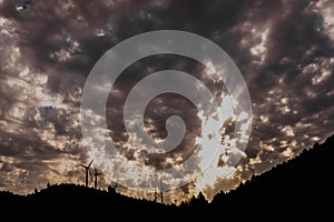 Wind turbines viewed from below help decontaminate the air photo