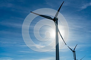 Wind turbines or wind energy converter in sunny day