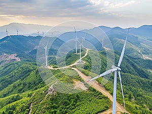 Wind turbines, Wind farm or wind park with turbines located on the mountains