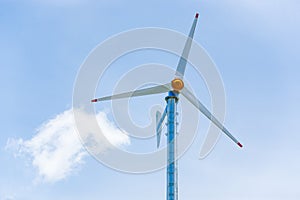 Wind turbines or Wind generators in light blue sky, white clouds background. Alternative energy. Wind Farm at sunshine day. Summer